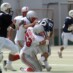 懸命のタックルにいくLB#53森岡